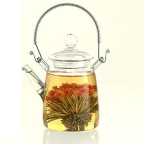 Elegant Glass Teapot With Ornate Handle